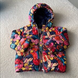 Next Blue Puffer Jacket with Colorful Patch